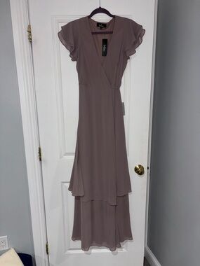 bodacious bella blush pink floral print maxi dress Lulus Bodacious Bella Blush Pink Floral Print Maxi Dress Size Small. EUC In excellent used condition. Back zipper, flattering V-neck & back, adjustable straps & tiered ruffled hem. Fitted at the waist